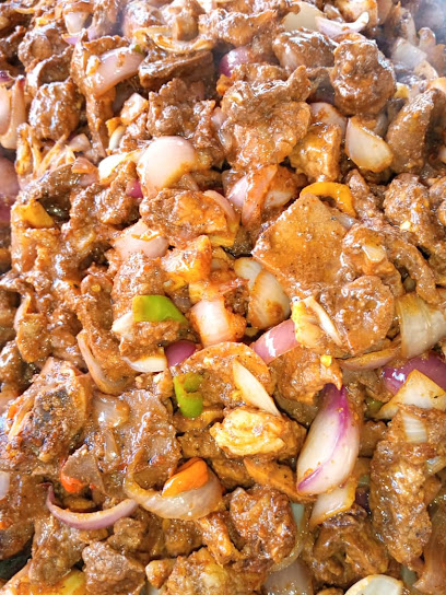 Alh Isa Cosmopolitan Suya Gallery restaurant exterior and interior view