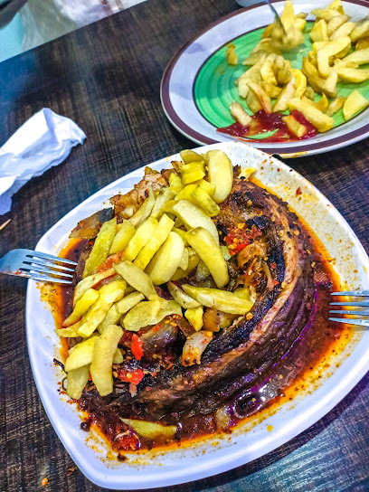 Alh Isa Cosmopolitan Suya Gallery II restaurant exterior and interior view