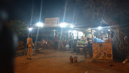 Alhaji Haladu Ram Suya restaurant exterior and interior view