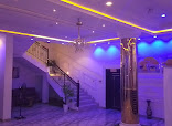 Chief Ikechukwu House restaurant photo 3 showing dining area and food