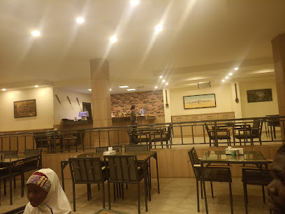 City Star Restaurant & Accommodation restaurant near Musa city center spot
