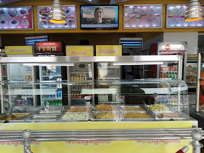 Crunchies Plus Concept Uyo restaurant exterior and interior view