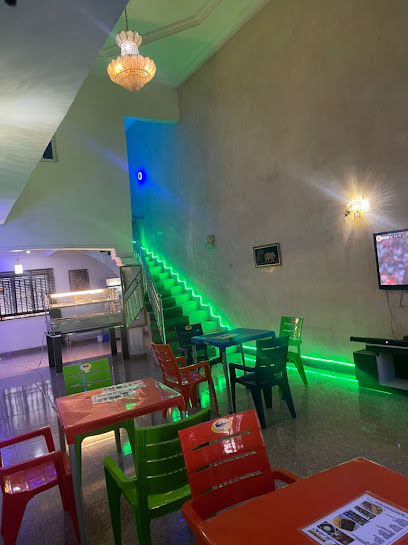 Deon's Cottage/Gi’s pot restaurant and Bar restaurant exterior and interior view