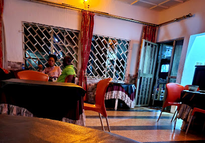 Eme Inn Calabar restaurant exterior and interior view
