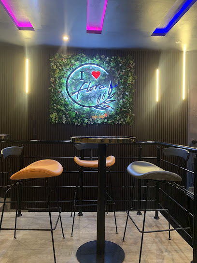 Flora Restaurant and Lounge restaurant near Hallmark Hotel, Oyo