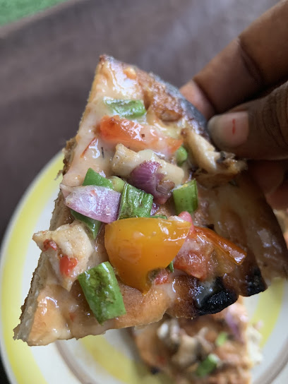 Flozy Tasty Shawarma restaurant exterior and interior view