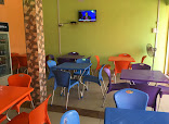 God's Hand Restaurant restaurant photo 2 showing dining area and food