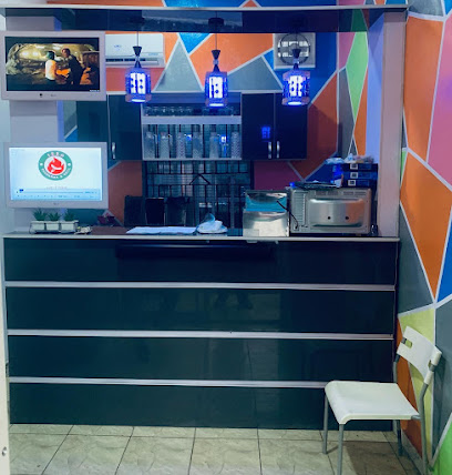 Izzo Shawarma Lagos restaurant exterior and interior view