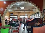 Madam Chinyere Restaurant restaurant photo 3 showing dining area and food