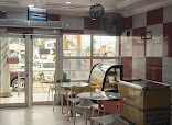Marvelous Restaurant restaurant photo 3 showing dining area and food