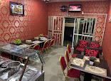 Mellows Tasty Chicken Nigeria Limited restaurant photo 3 showing dining area and food