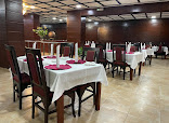 MR BASSEY RESTAURANT restaurant photo 3 showing dining area and food