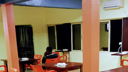 Ówàmbẹ Kitchen restaurant exterior and interior view