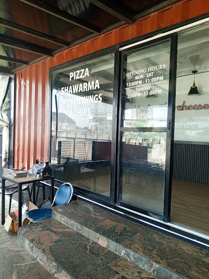Pizeria Café & Grill restaurant exterior and interior view