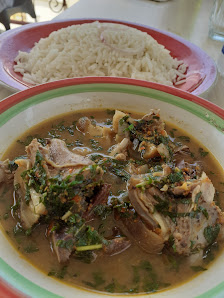 Pounix Farm And Lodge restaurant photo 2 showing dining area and food