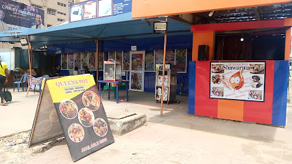 Queens Pot: The African Village Kitchen restaurant exterior and interior view