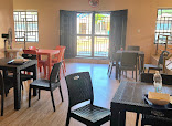 Tudot Restaurant restaurant photo 3 showing dining area and food