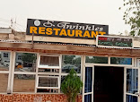 Twinkle Restaurant restaurant photo 3 showing dining area and food