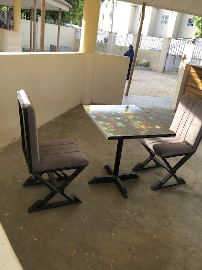 White Arena Kitchen restaurant exterior and interior view